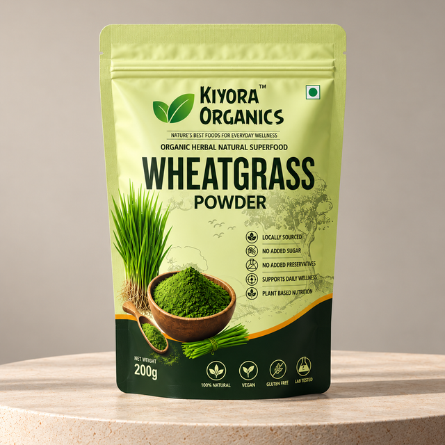 Kiyora Organics Wheatgrass Powder pouch, 200g, on a stone pedestal
